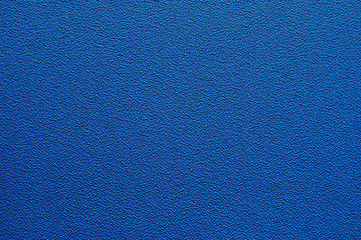 textureof blue cloth on the wall