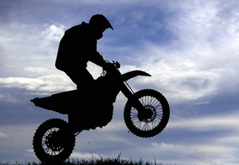 Motocross racer silhouette