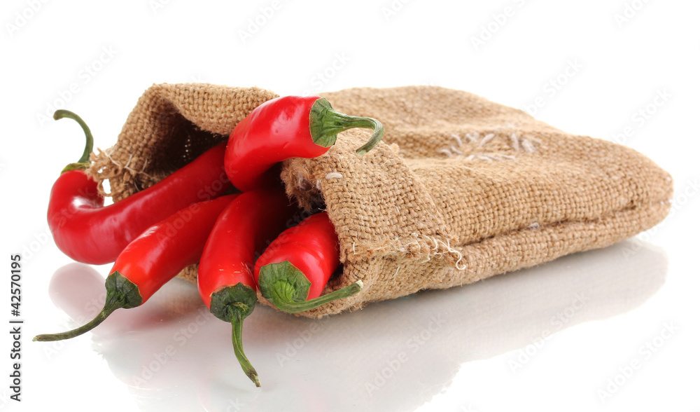 Red hot chili peppers in bag isolated on white