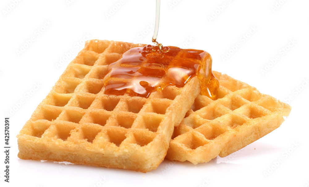 belgium waffles with honey isolated on white