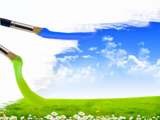 Paint brushes and landscape image