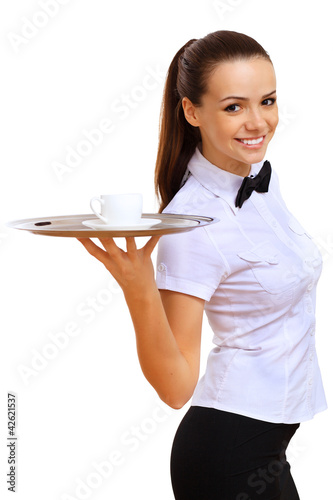 Fototapeta na wymiar Young waitress with an empty tray