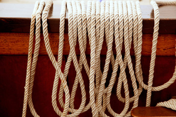 Wall Mural - Marine ropes in a row on vintage wooden boat