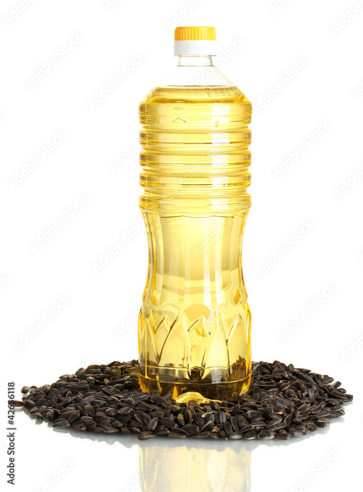 sunflower oil with sunflower seeds isolated on white background