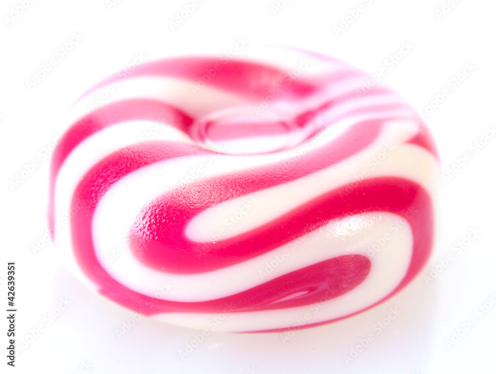 striped fruit candy isolated on white