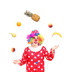 Sticker - A smiling clown juggling fruits