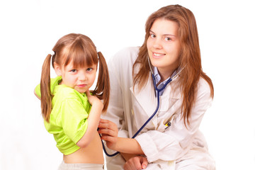 medical doctor woman inspects beautiful little girl