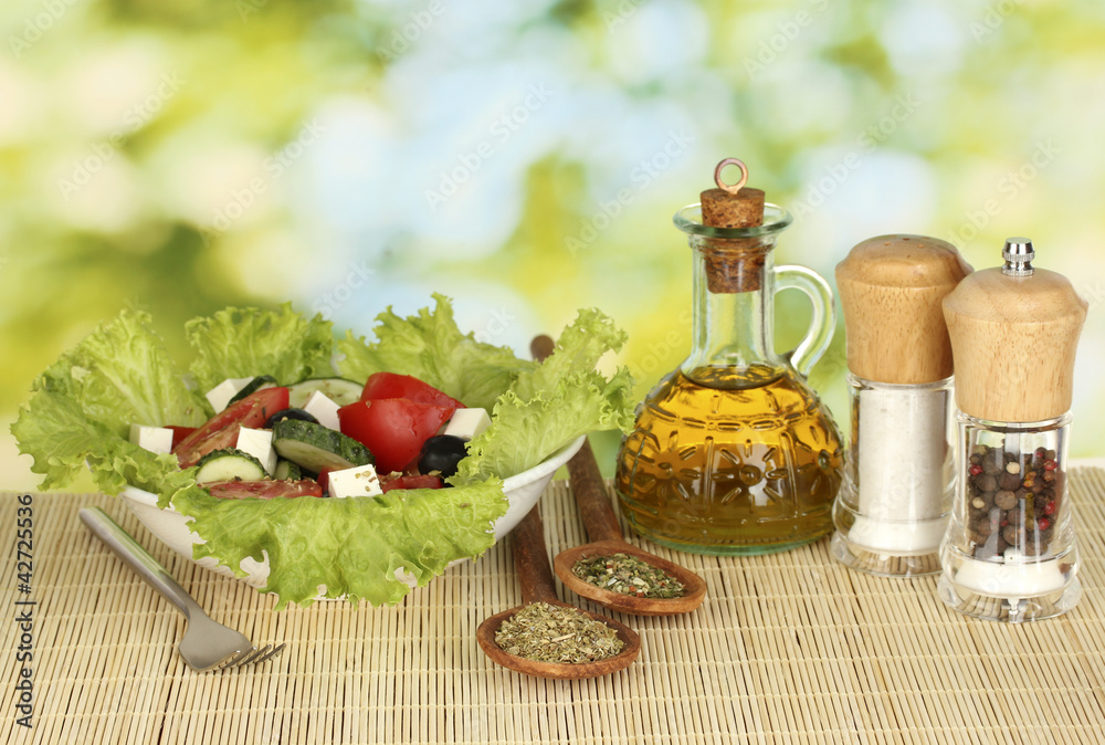 tasty greek salad on bright green background