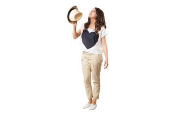 Wall Mural - young fashionable brunette throwing a stylish hat