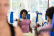 © Diego Cervo - young people training and working out in fitness club