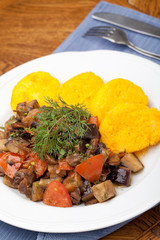 Wall Mural - Polenta slices with vegetable stew