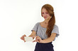 © fotocomo - girl holding small white card