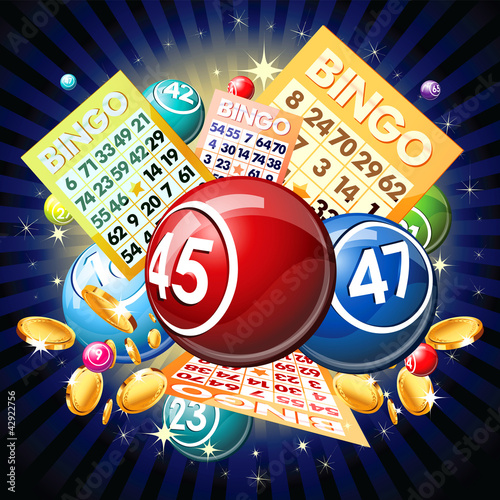 фотография Bingo balls and cards on golden background
