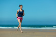 © Luis Viegas - Girl running on the beach in barefoot