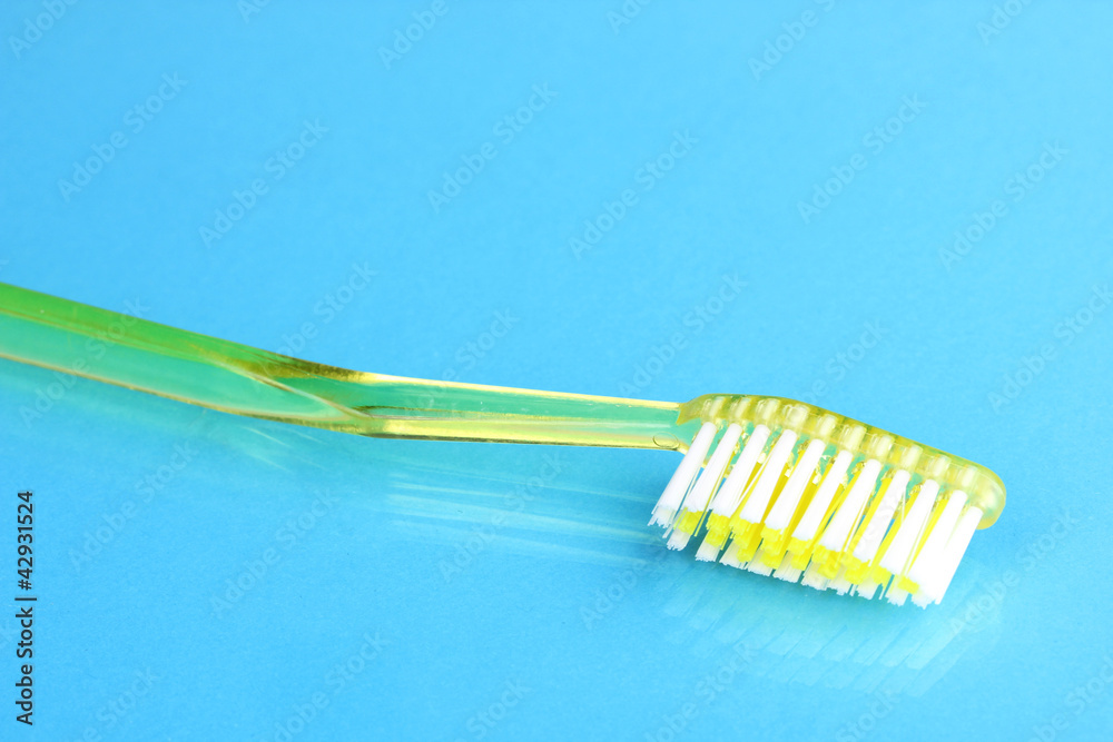 Toothbrush on blue background