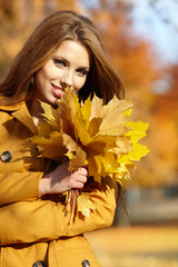 Sticker - Beautiful elegant woman in a autumn park