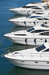 Wall Mural - White motor yacht over harbor pier, Odessa, Ukraine