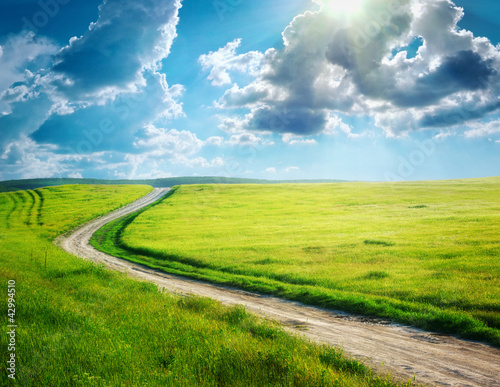 Naklejka dekoracyjna Road lane and deep blue sky