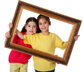 Two girls with a picture frame