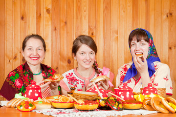 Wall Mural - Women eats pancake