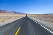 © travelview - Death Valley road straight across the desert to the mountains in