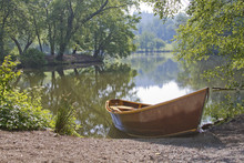 Rowboat By A Peaceful Lake