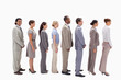 © WavebreakmediaMicro - Profile of a smiling business team in single line