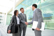 © goodluz - Business people meeting on a trade show
