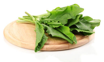 Fresh sorrel on wooden board isolated on white