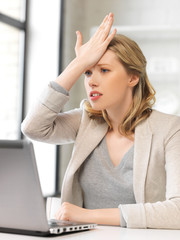 Wall Mural - stressed woman with laptop computer