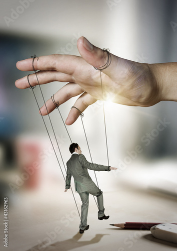 Fototapeta na wymiar Businessman On Strings