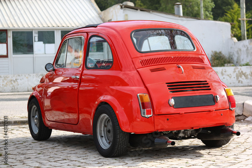 Fototapeta na wymiar Small Classic Red Car