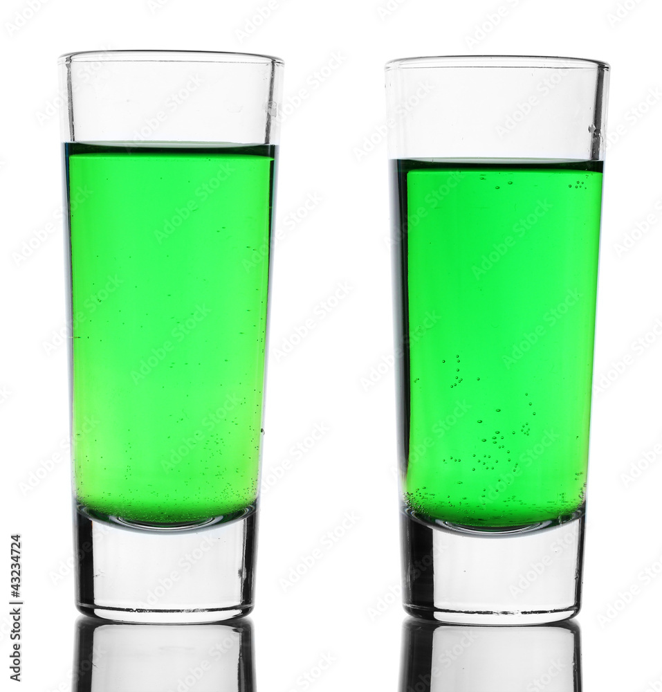 Two glasses of absinthe isolated on white