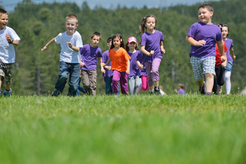 Wall Mural - happy kids group  have fun in nature