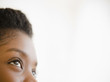 © JGI/Jamie Grill/Blend Images - Close up of Black woman looking upwards