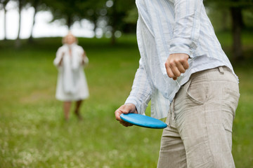 Man Holding Flying Disc