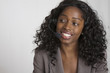 © Peter Dressel/Blend Images - Black businesswoman talking on headset