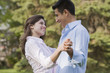 © REB Images/Blend Images - Hispanic couple dancing together outdoors
