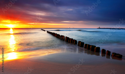 Naklejka na szafę Baltic sea at beautiful sunrise in Poland beach.