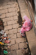 © Martin M303 - Poor woman on the dirty street, India