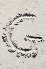 Sand beach alphabet: letter G