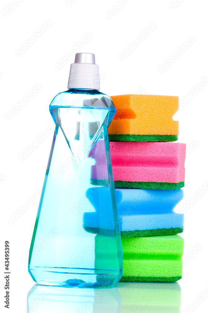 Dishwashing liquid and sponges isolated on white