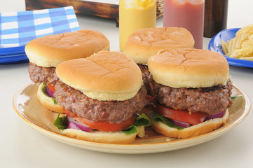 Canvas Print - Serving platter of thick burgers