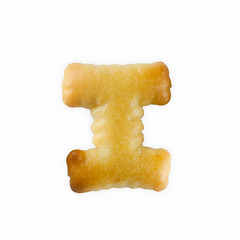 Fototapete - I-shape cracker in the form of alphabet