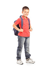 Full length portrait of a school boy with backpack