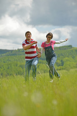 Wall Mural - romantic young couple in love together outdoor