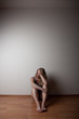 © listercz - depressed young lonely woman girl, sitting on the floor alone