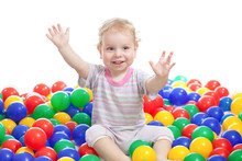 Happy Boy Playing Colorful Balls Isolated On White