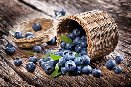 Fototapeta na wymiar Blueberries have dropped from the basket