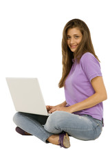 Wall Mural - teenage girl using laptop